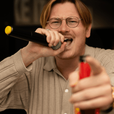 man singing karaoke