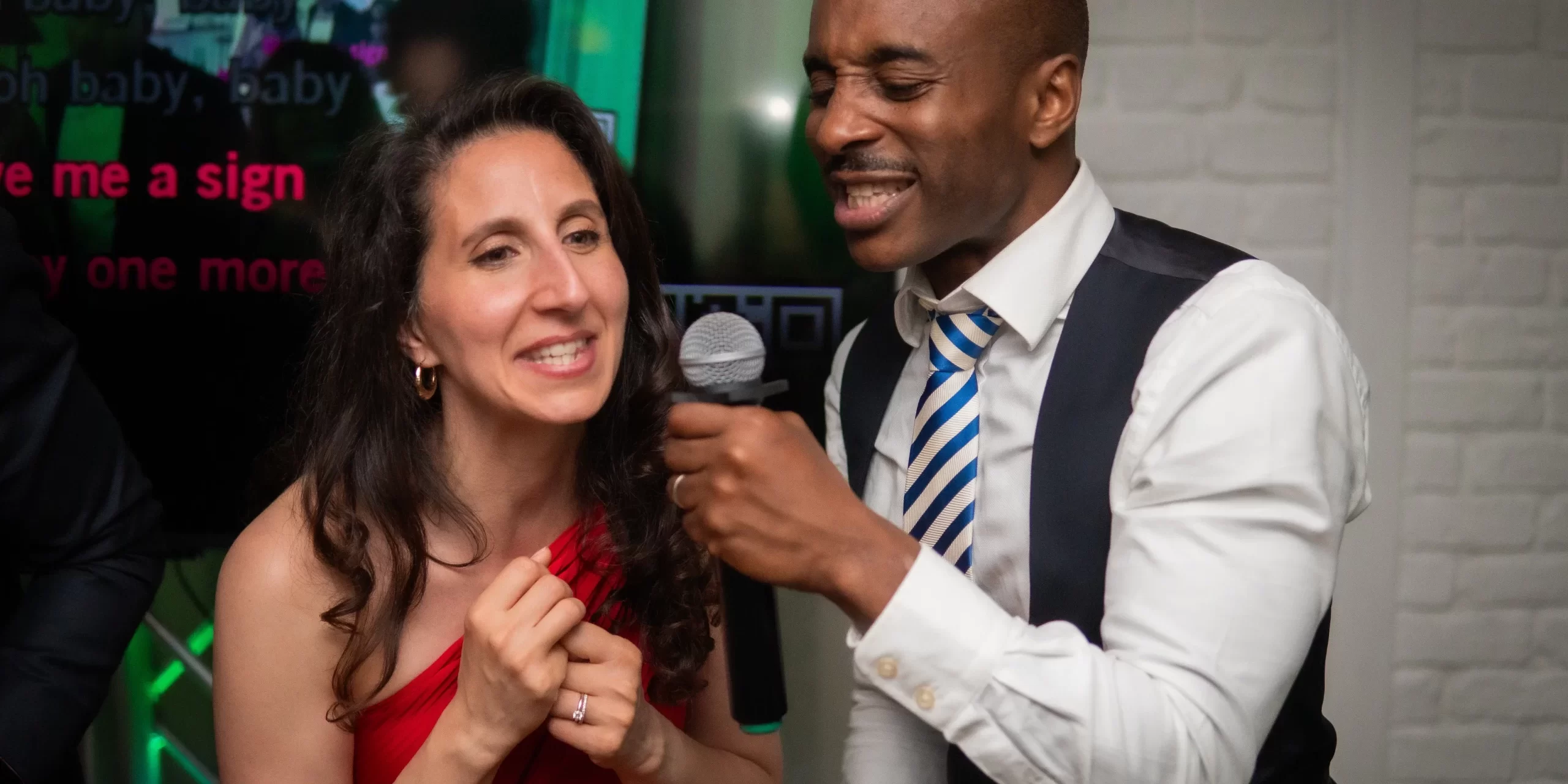 people singing karaoke together